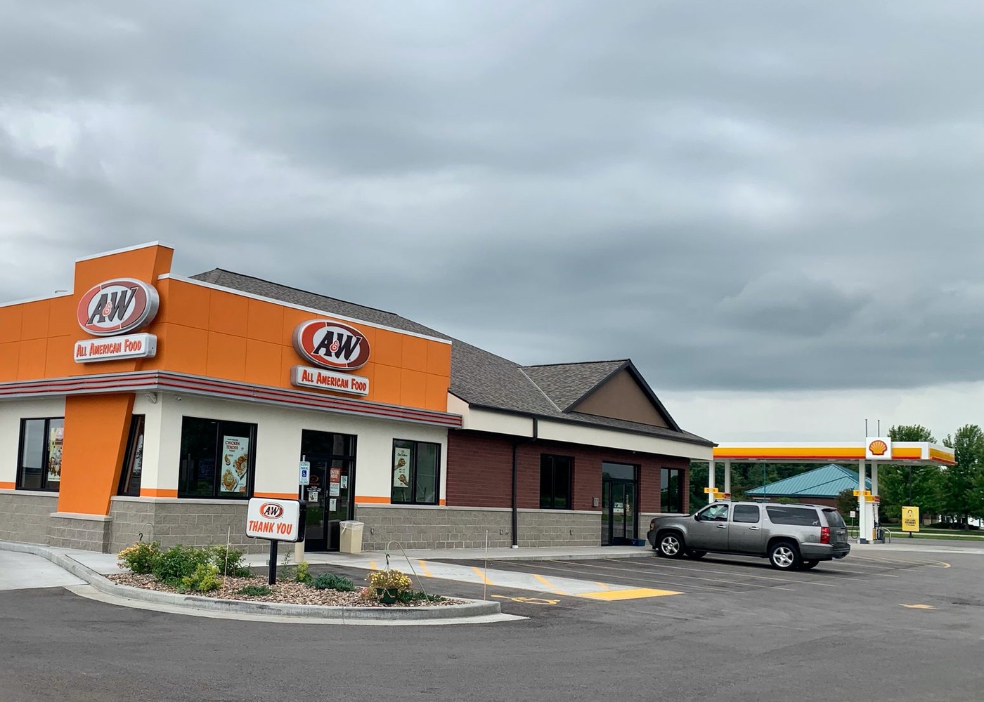 Exterior of A&W Restaurant in Winneconne, Wisconsin connected to a Shell gas station.