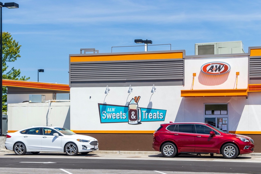 Photo of two cars in an A&W Restaurant drive-thru