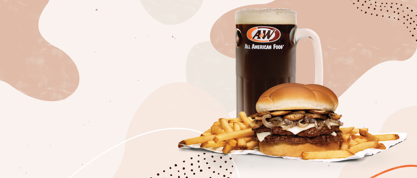 A Double Mushroom Onion Melt Burger is on the right side of the image. The burger includes two burger patties, grilled onions, grilled mushrooms, and swiss cheese. A pile of fries is behind the burger and a mug of A&W Root Beer is on the left side of the burger.