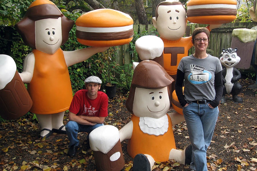 Photo of Jeff Kunkle and Kelly Burg with three A&W Burger Family Statues