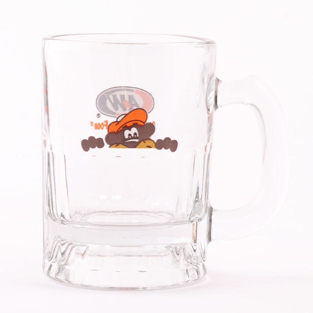 3.5 oz. 'Baby Mug' featuring artwork of Rooty the Great Root Bear peeking in the center.