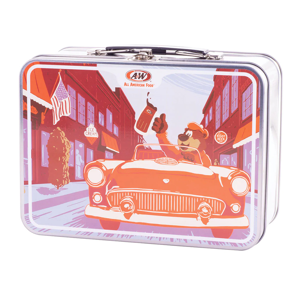 Tin lunchbox with art of Rooty driving orange car down the street on front