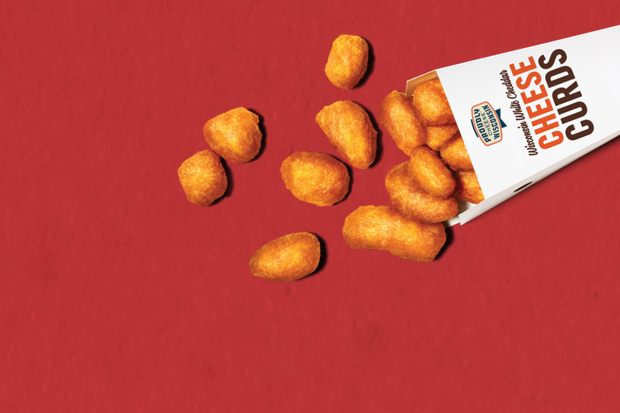 Sriracha Cheese Curds on a red background